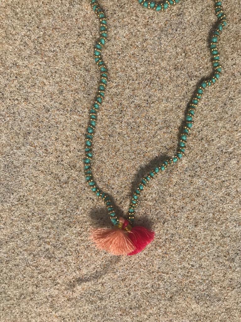 TURQUOISE GLASS BEADED NECKLACE WITH LITTLE GOLD THREADS RINGS AND TWO TASSELS
