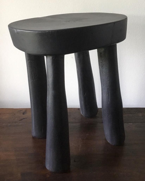 LATE 20TH CENTURY AFRICAN BLACK WOOD STOOL